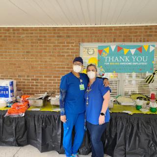 Healthcare professionals gathering at a thank you event, showing appreciation for their hard work.