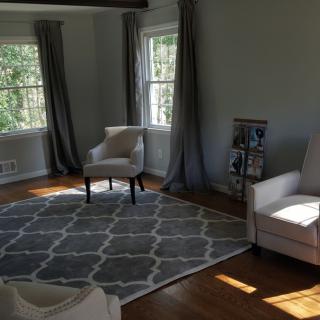 A cozy living room with soft lighting and elegant decor.