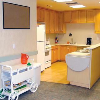 A well-organized kitchen space with wooden cabinets and modern appliances.