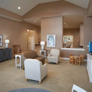 Spacious living room with comfortable seating and modern decor.