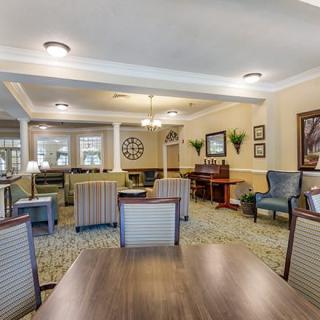 A cozy and well-decorated living room with comfortable seating and elegant decor.