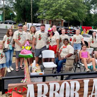 A vibrant community gathering captured during a festive event, showcasing the spirit of togetherness.