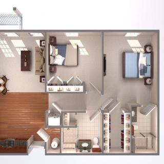 A detailed floor plan of a two-bedroom apartment featuring a living room, kitchen, and bathrooms.