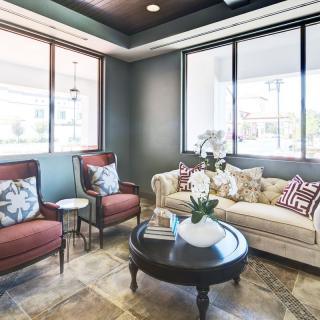 A cozy living room with elegant seating and decor.