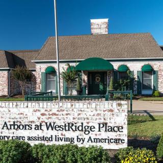 An exterior view of The Arbors at WestRidge Place, a senior care assisted living facility.