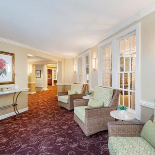 A cozy lobby area with comfortable seating and elegant decor.