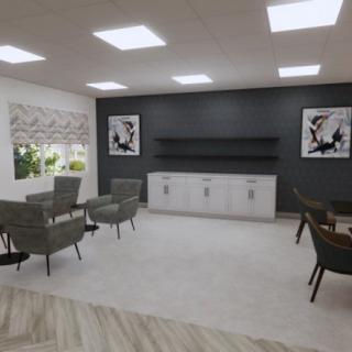 A modern office interior with a minimalist seating area and artwork on the walls.