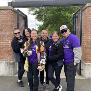 A fun day out with friends, celebrating together in our matching purple shirts!