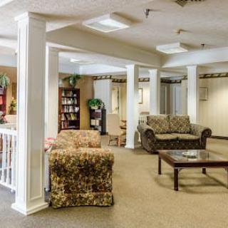 A spacious lobby with comfortable seating and elegant decor.