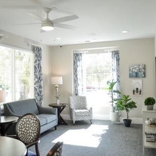 A bright and airy living room with modern decor and abundant natural light.