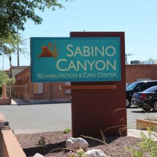 Entrance sign for Sabino Canyon Rehabilitation & Care Center.