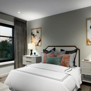A modern bedroom with elegant decor and cozy ambiance.