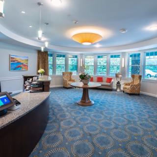 A welcoming lobby area with a reception desk and comfortable seating.