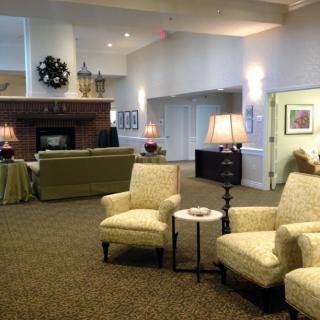 A cozy lobby with comfortable seating and elegant decor.