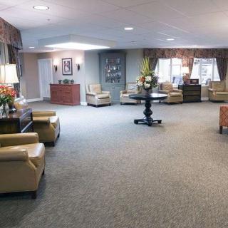 A warmly decorated lobby with comfortable seating and elegant decor.
