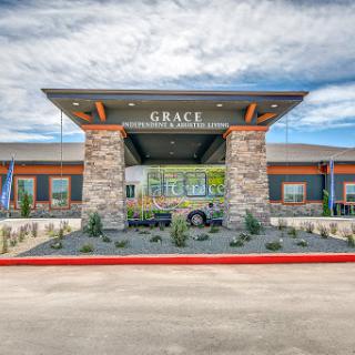 The welcoming entrance to Grace, showcasing modern architectural design and thoughtful landscaping.