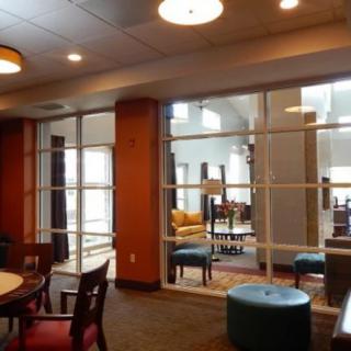 A modern lobby interior with comfortable seating and stylish furniture.