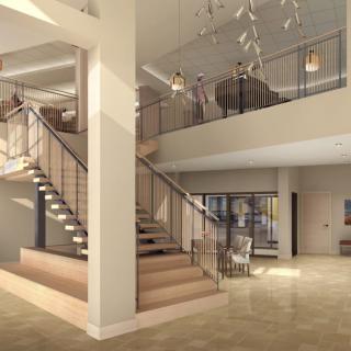 A modern interior featuring a sleek staircase and an open balcony area.