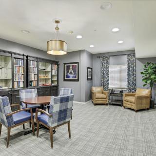 A stylish living room with comfortable seating and elegant decor.
