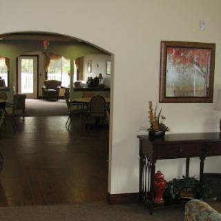 A view of a spacious lobby with comfortable seating and decorative elements.