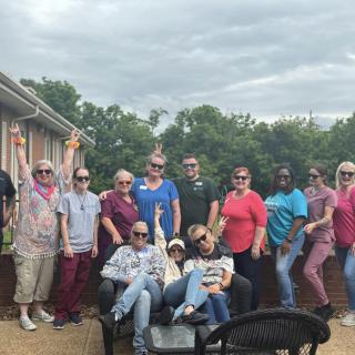 A group of people enjoying a casual outdoor gathering.