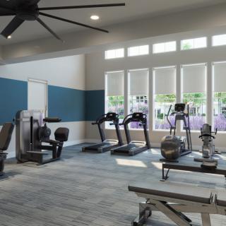 A modern gym facility with treadmills and stationary bikes.
