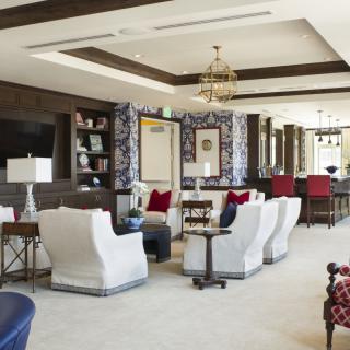 A modern lounge area with elegant furniture and stylish decor.