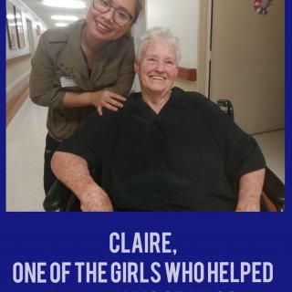 A caregiver and an elderly woman smiling together in a nursing home.