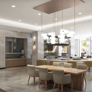 A modern kitchen and dining area with sleek design elements and contemporary furniture.