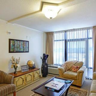A cozy living room featuring comfortable seating and tasteful decor.