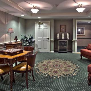 A cozy lobby interior with stylish furniture and elegant decor.