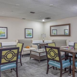 A cozy lounge area with comfortable seating and tasteful decor.