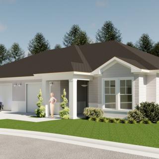 A modern suburban home with a well-maintained lawn and clear blue sky.