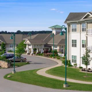 A well-maintained suburban residential area with modern apartments and landscaped surroundings.