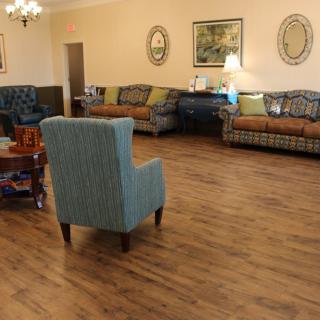 A cozy living room with comfortable seating and warm decor.