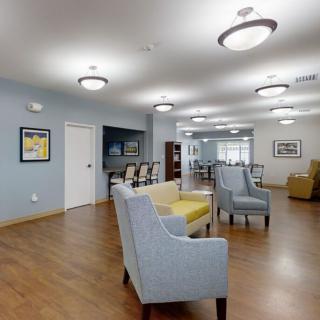 A modern lobby area with comfortable seating and elegant lighting.