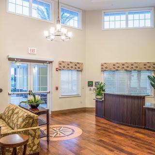 A spacious reception area with comfortable seating and elegant decor.