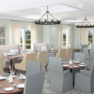 Elegant dining room with neatly arranged tables and comfortable seating.