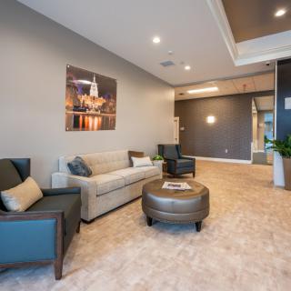 A modern lobby with comfortable seating and elegant decor.