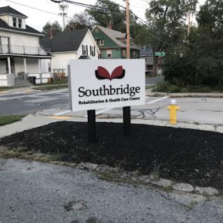 A sign indicating the Southbridge location in a residential area.