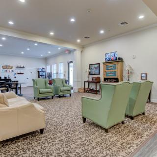 A spacious living room with comfortable seating and stylish decor.