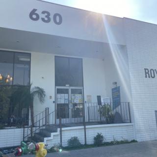 A modern building with a welcoming entrance, featuring the number '630' prominently displayed.
