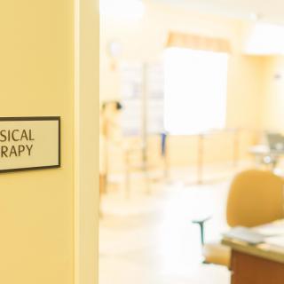 A physical therapy room with a welcoming and bright interior.
