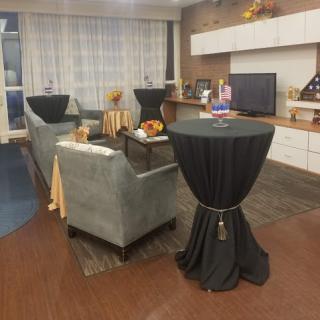 A cozy living room setting featuring elegant furniture and decor.