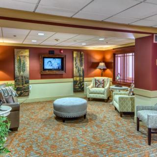 A modern hotel lobby with comfortable seating and stylish decor.