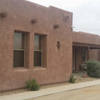A charming adobe-style house showcasing southwestern architecture.