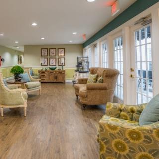 A cozy living room with comfortable seating and inviting decor.