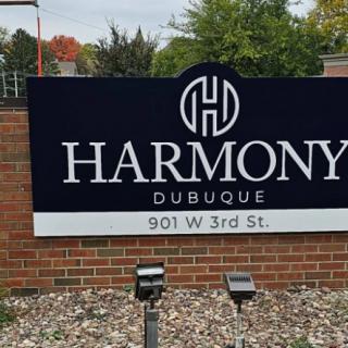 Sign for Harmony located at 901 W 3rd St in Dubuque.