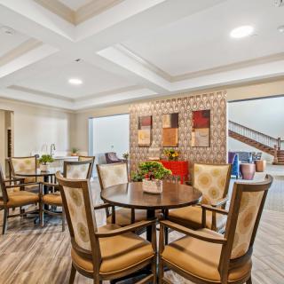 A modern dining area with elegant seating and stylish decor.