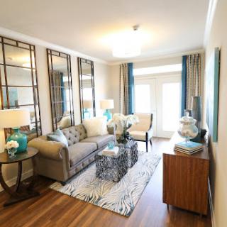 A stylish living room featuring modern furnishings and a vibrant decor.